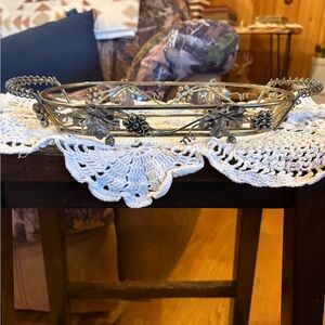 Vintage metal serving dish holder or basket with an ornate grape & vine design